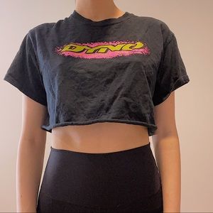 UO dino bmx racing cropped graphic tee